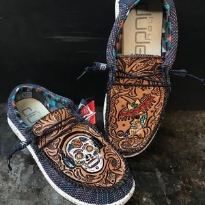 Custom hand tooled tops for shoes